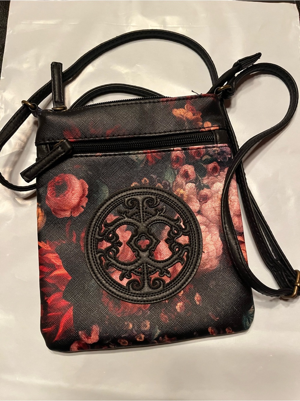 Black Floral Crossbody Bag with Embroidered Medallion Accent